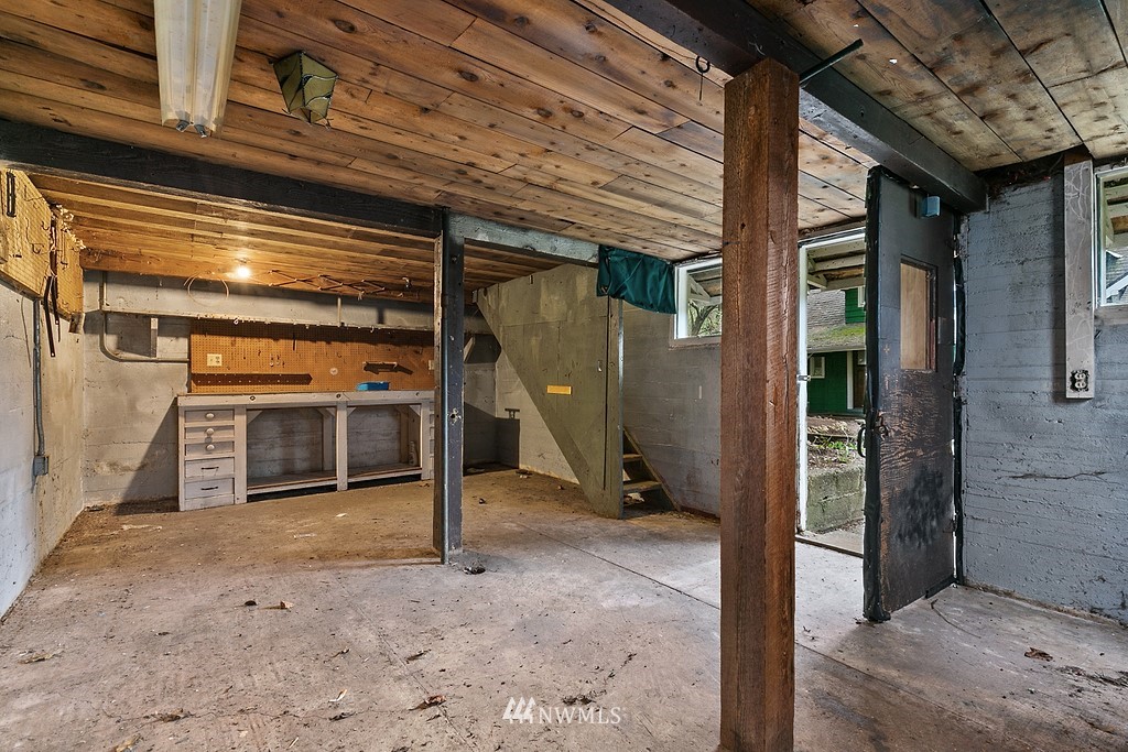2620 Callow Road Lake Stevens, WA 98258 - Photo 23 of 25 a view of a hallway with wooden walls