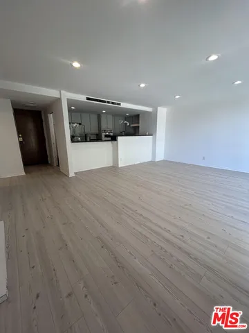 a view of a building with a yard