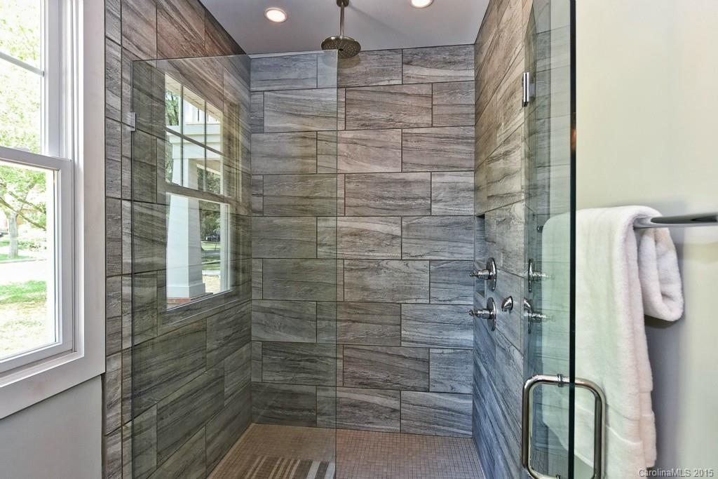 913 Sedgefield Road Charlotte, NC 28209 - Photo 13 of 24 a bathroom with a shower
