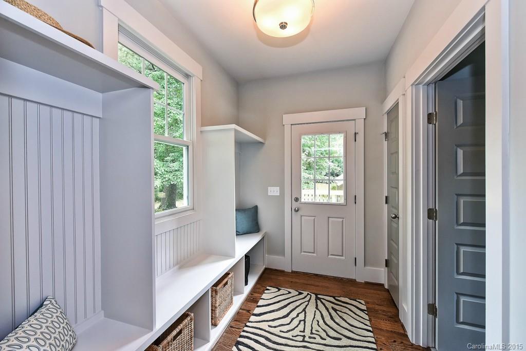 913 Sedgefield Road Charlotte, NC 28209 - Photo 15 of 24 a view of a room with wooden floor and windows