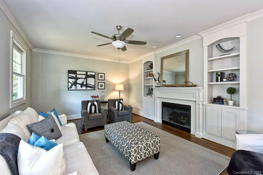 913 Sedgefield Road Charlotte, NC 28209 - Photo 8 of 24 a living room with furniture and a fireplace