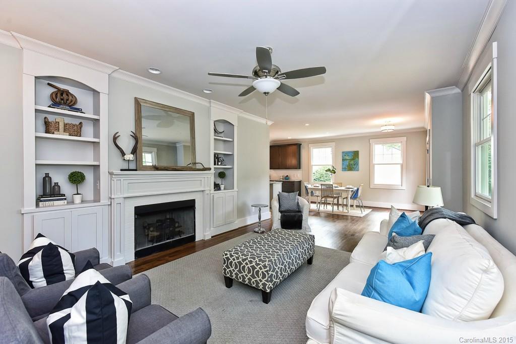 913 Sedgefield Road Charlotte, NC 28209 - Photo 9 of 24 a living room with furniture fireplace and window