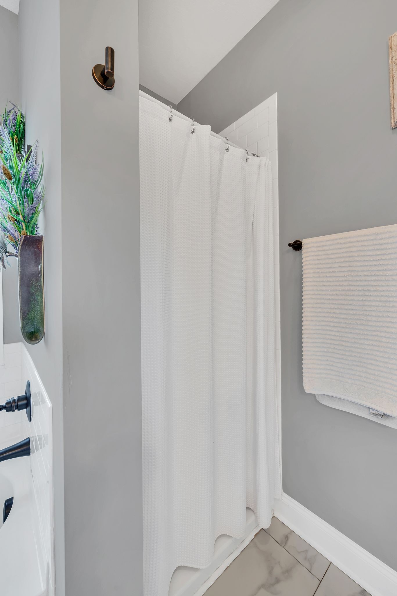 2507 Pleasant View Road Pleasant View, TN 37146 - Photo 25 of 38 a bathroom with a shower curtain and a window