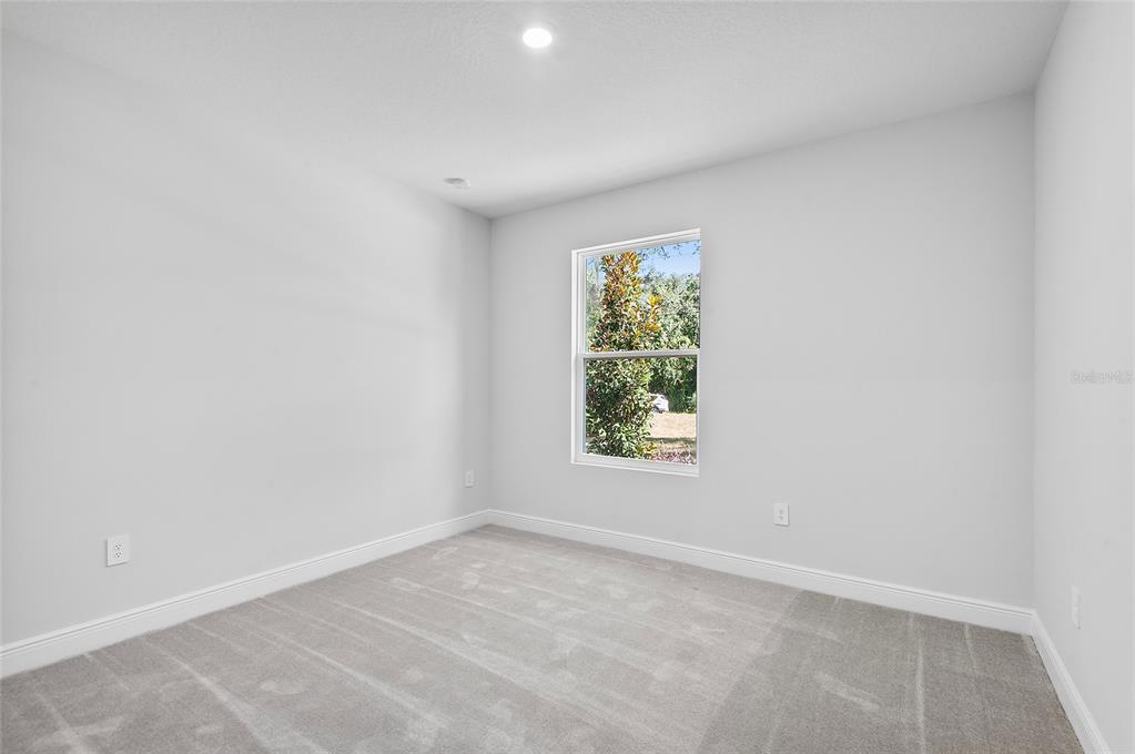 304 North Jungle Road Geneva, FL 32732 - Photo 34 of 49 an empty room with a window