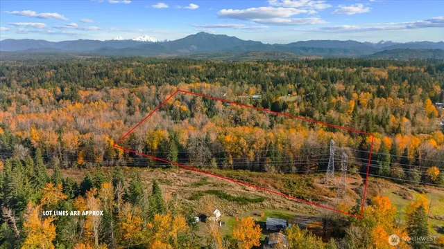a view of lake with green space