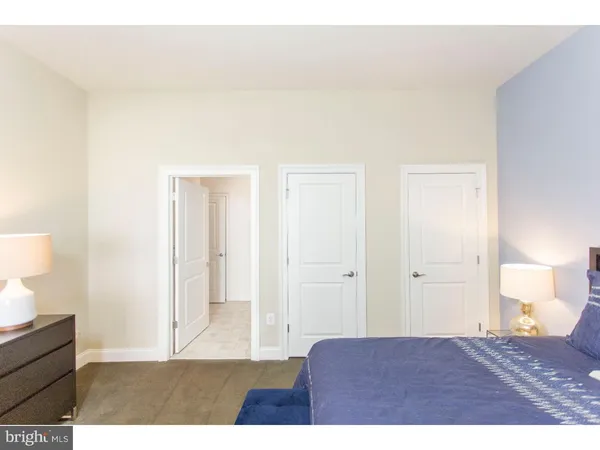 a view of bedroom and bathroom