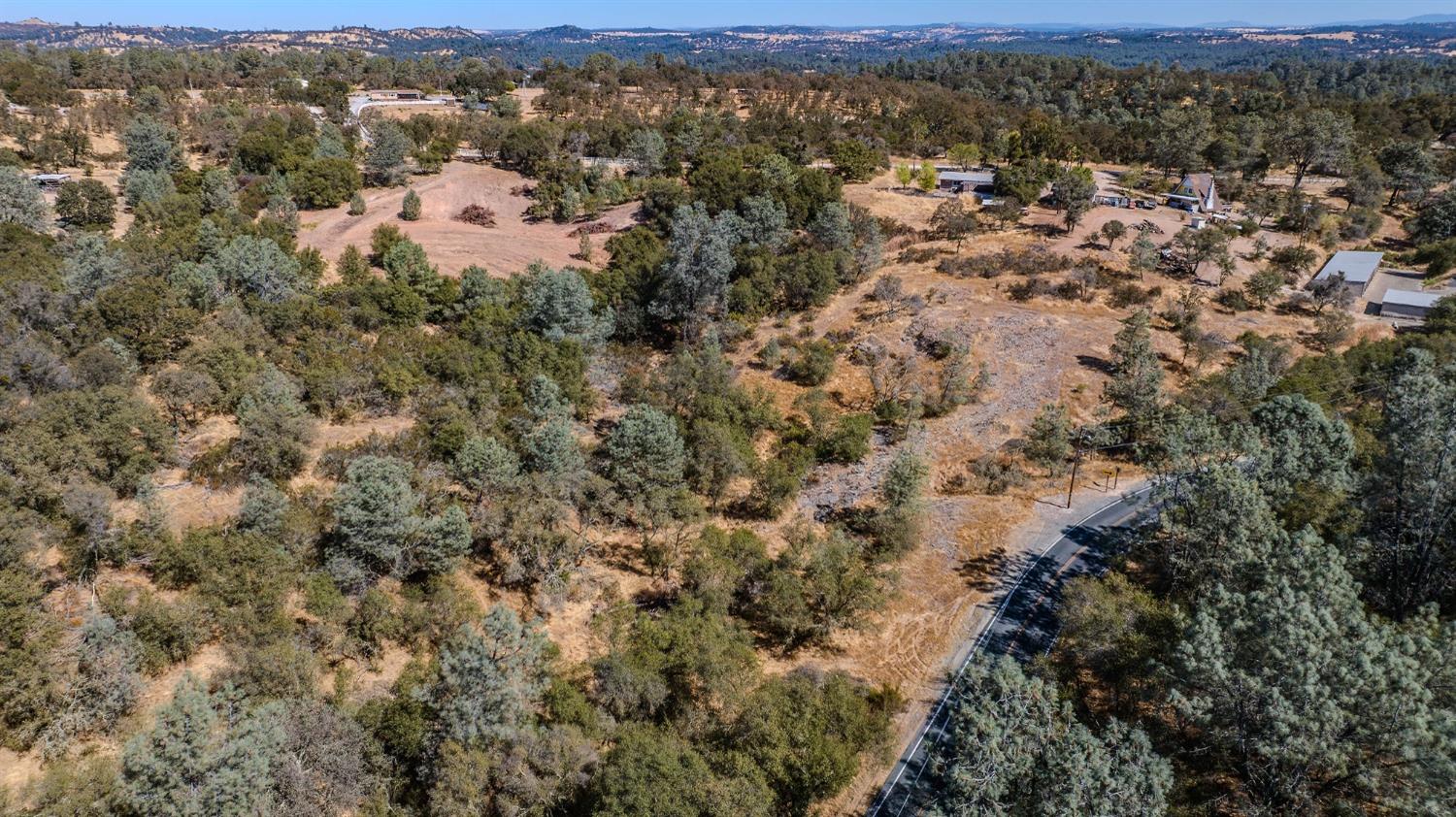0 Brandy Lane Burson, CA 95225 - Photo 24 of 28 an aerial view of residential houses with outdoor space and trees