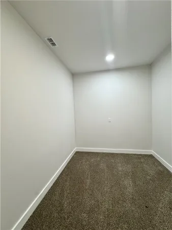 an empty room with a workbench