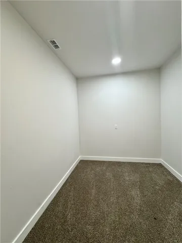 an empty room with a workbench