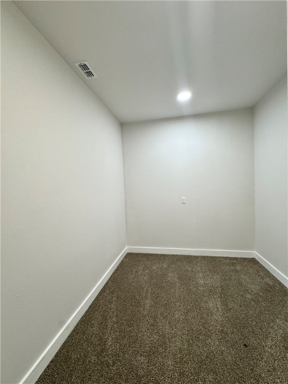 947 Mesquite Street Robstown, TX 78380 - Photo 13 of 16 an empty room with a workbench