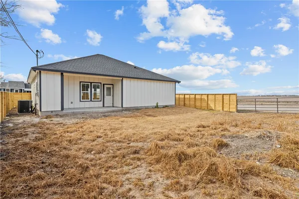 a view of an house with backyard space