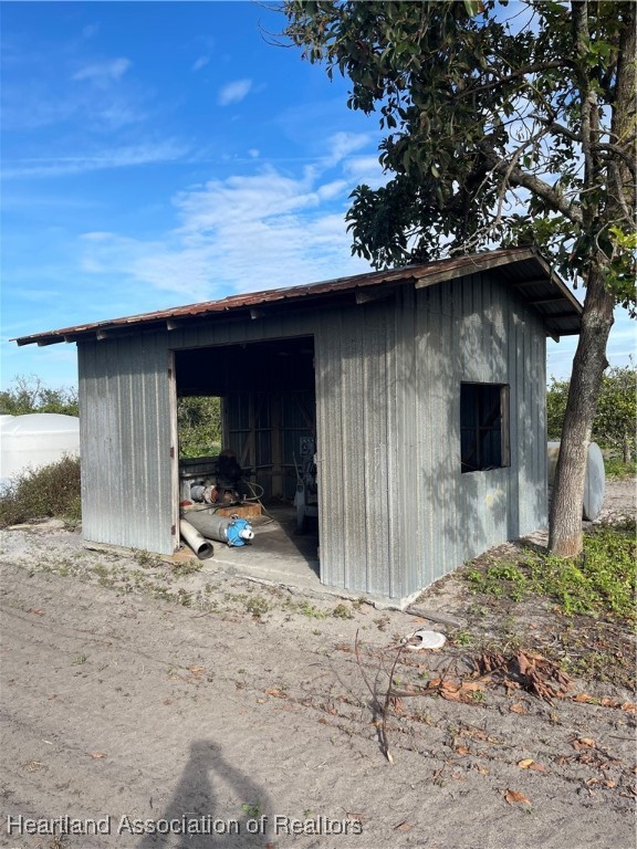 Maude Road Wauchula, FL 33873 - Photo 5 of 12 a front view of a house with a yard