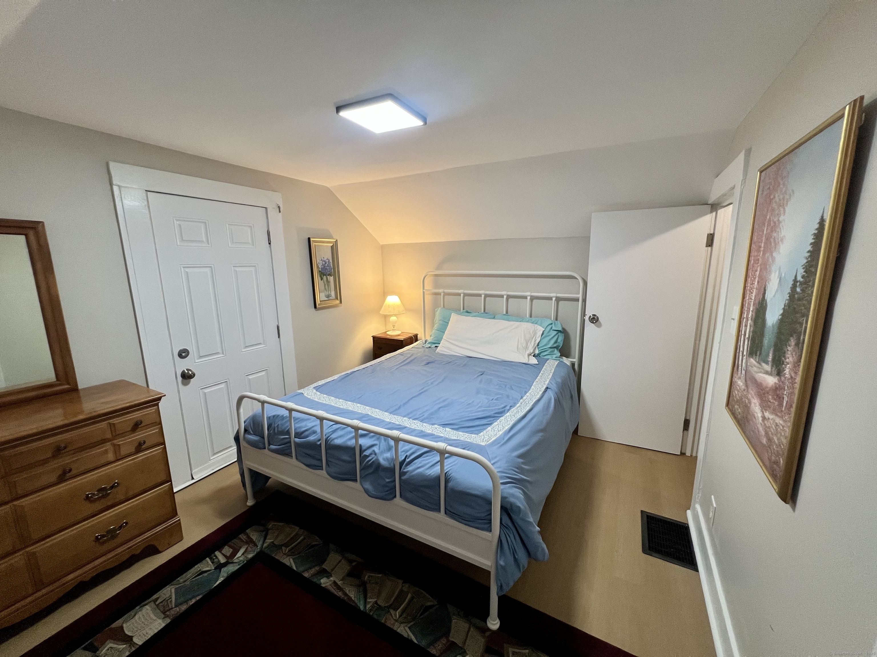 111 Fort Hale Road New Haven, CT 06512 - Photo 17 of 21 a bedroom with a bed and a dresser