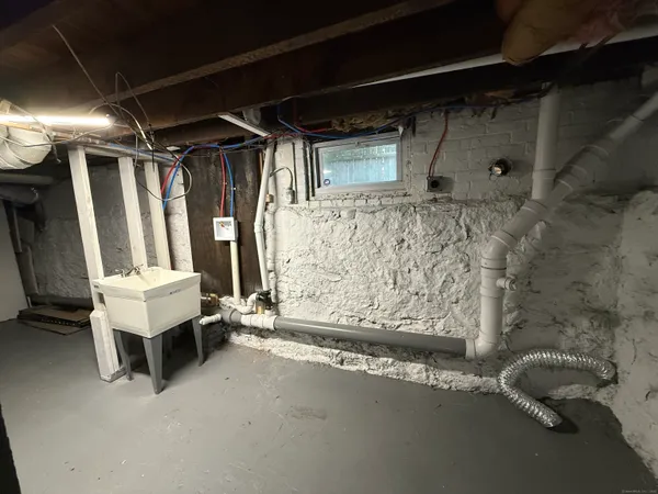 a bathroom with a tub and a shower