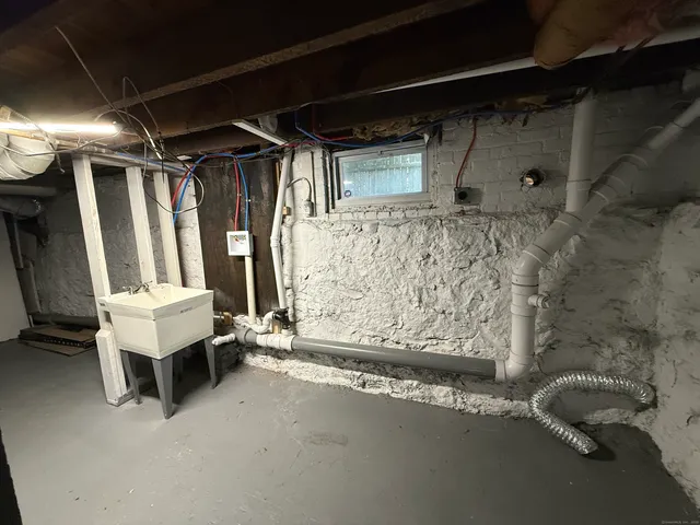 a bathroom with a tub and a shower