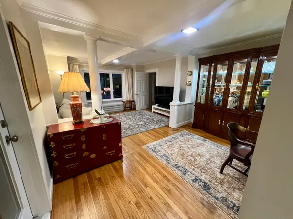 a living room with furniture and a rug
