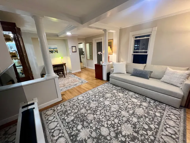 a living room with furniture and a couch