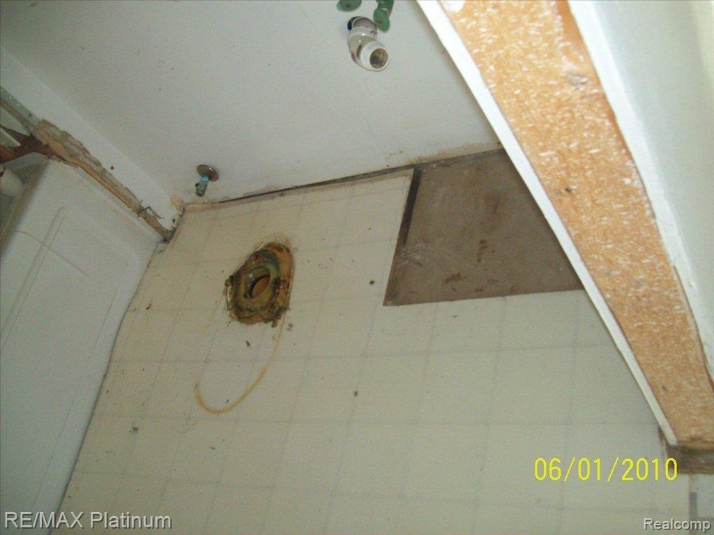 3321 North Burkhart Road Howell, MI 48855 - Photo 8 of 20 MISSING TOILET & SINK