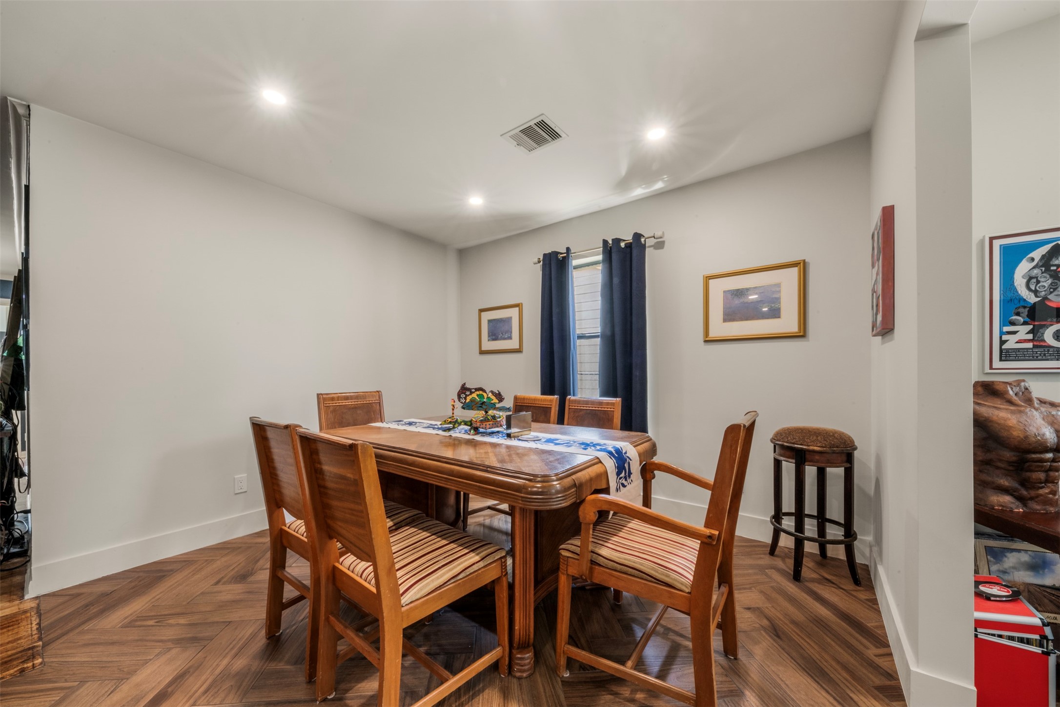 1913 Thonig Road Houston, TX 77055 - Photo 20 of 36 a view of a dining room with furniture and wooden floor