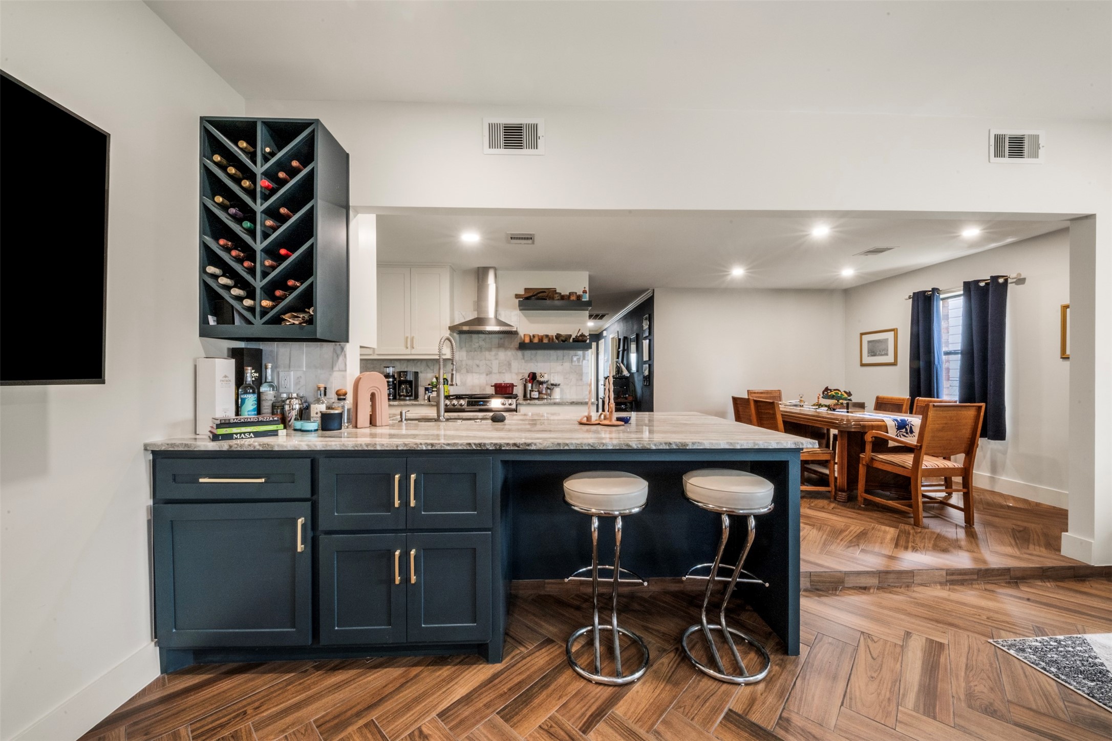 1913 Thonig Road Houston, TX 77055 - Photo 21 of 36 a kitchen with a sink cabinets and wooden floor