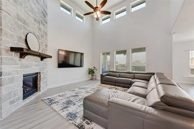 a large kitchen with granite countertop a large stove a sink dishwasher and a refrigerator