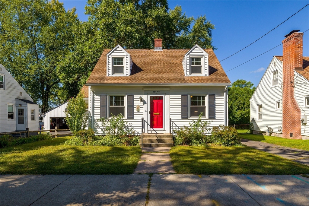 54 Ellsworth Avenue Springfield, MA 01118 - Photo 1 of 29 a front view of a house with a yard