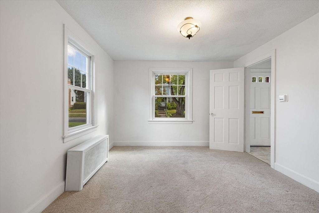54 Ellsworth Avenue Springfield, MA 01118 - Photo 12 of 29 a view of an empty room with a window