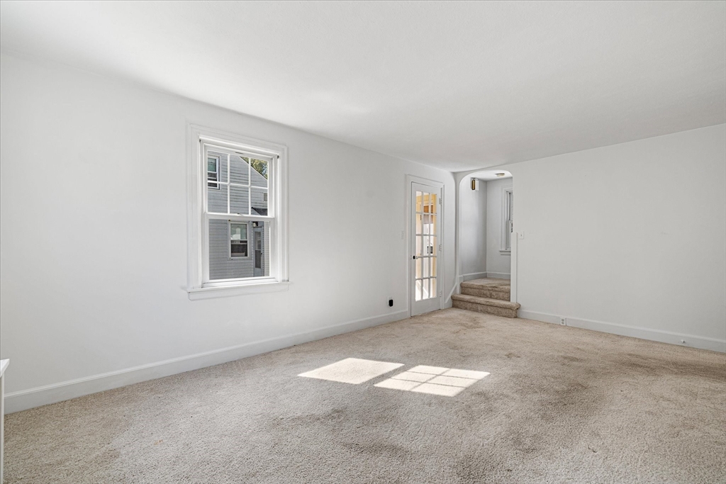 54 Ellsworth Avenue Springfield, MA 01118 - Photo 17 of 29 an empty room with windows