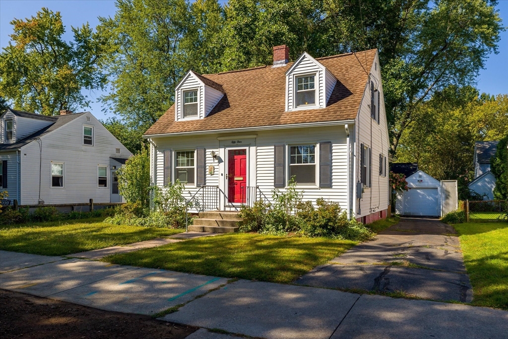54 Ellsworth Avenue Springfield, MA 01118 - Photo 2 of 29 a front view of a house with garden