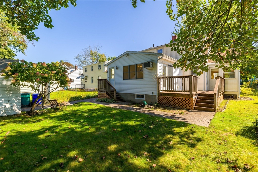 54 Ellsworth Avenue Springfield, MA 01118 - Photo 25 of 29 a view of a house with backyard and sitting area