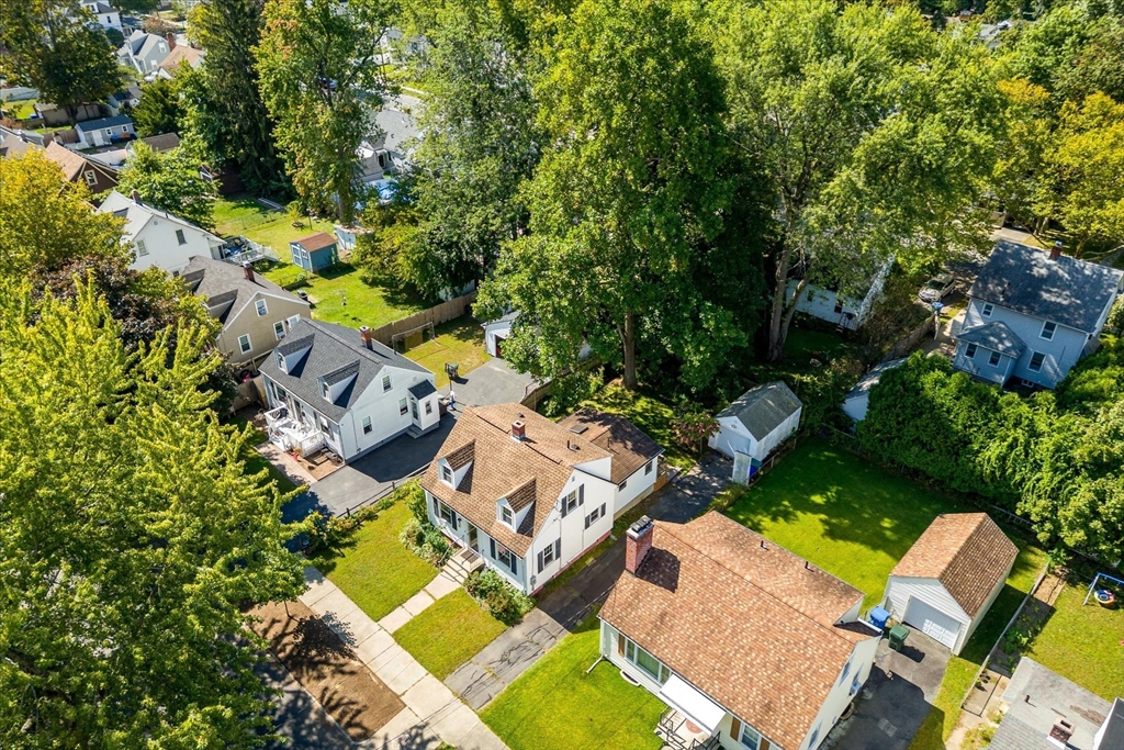 54 Ellsworth Avenue Springfield, MA 01118 - Photo 4 of 29 an aerial view of residential house with outdoor space and swimming pool