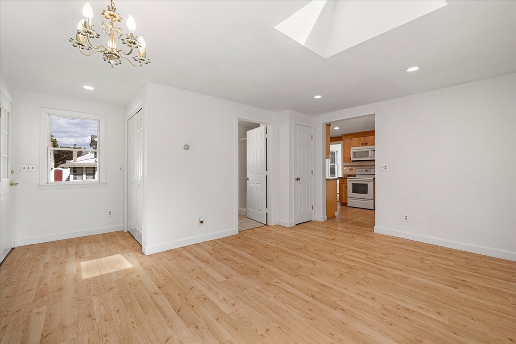 54 Ellsworth Avenue Springfield, MA 01118 - Photo 9 of 29 a view of empty room with wooden floor