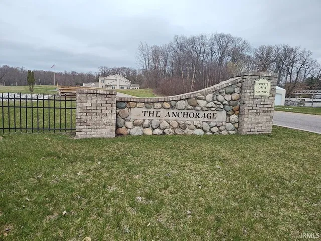 a view of a field with fence