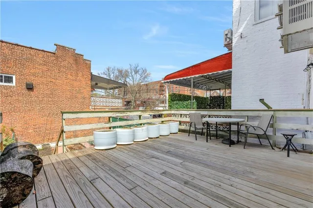 a view of dining room and wooden floor