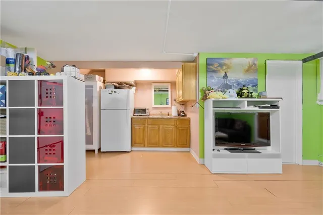 a living room with furniture and a white table