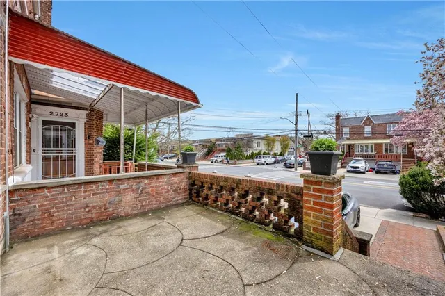 a view of a balcony with chairs
