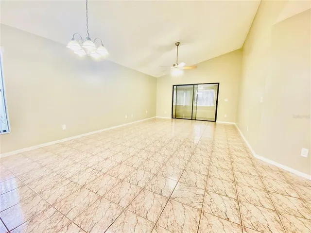 a view of a room with a large window