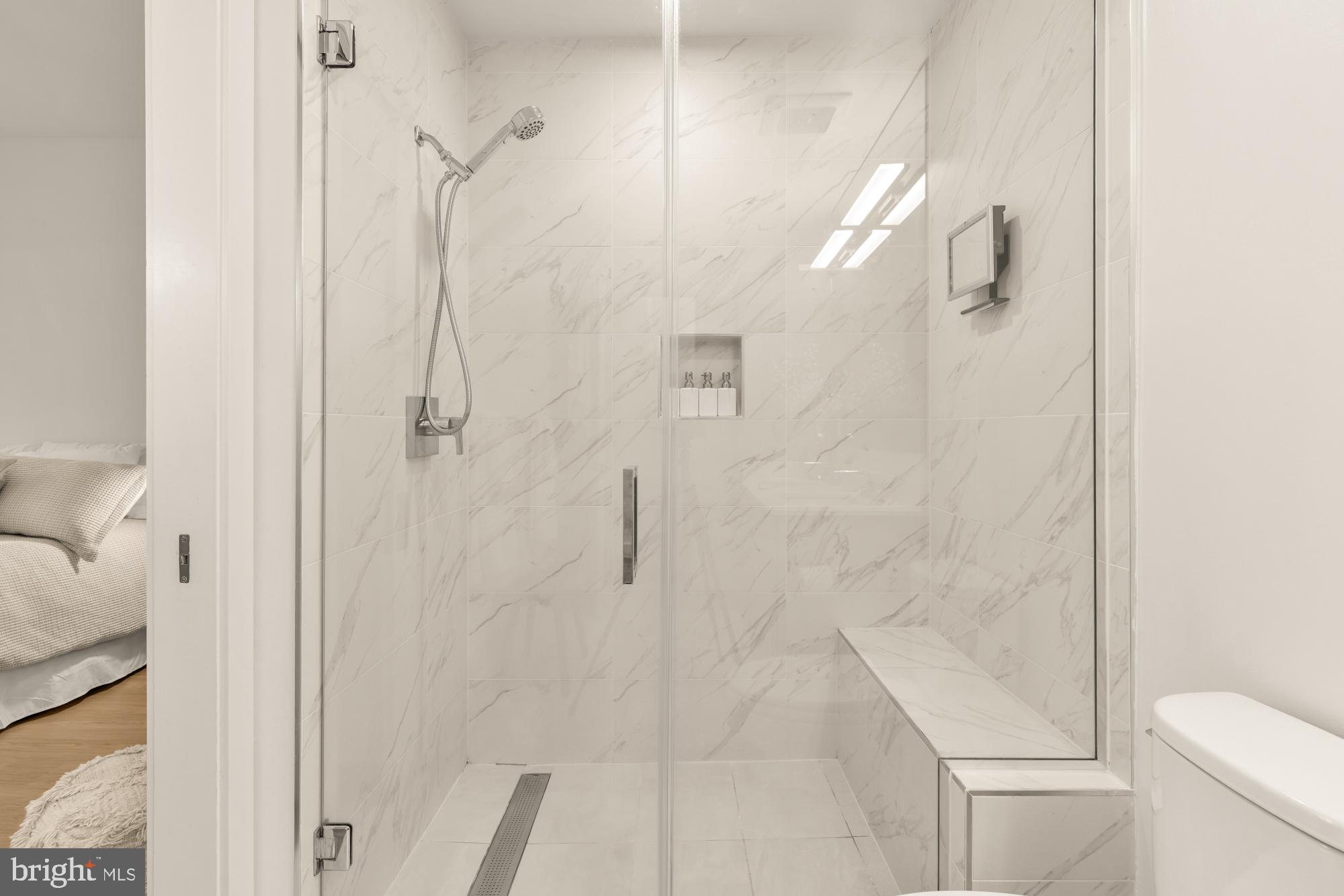 1761 P Street Northwest, Unit 202 Washington, DC 20036 - Photo 14 of 17 a bathroom with a shower and toilet