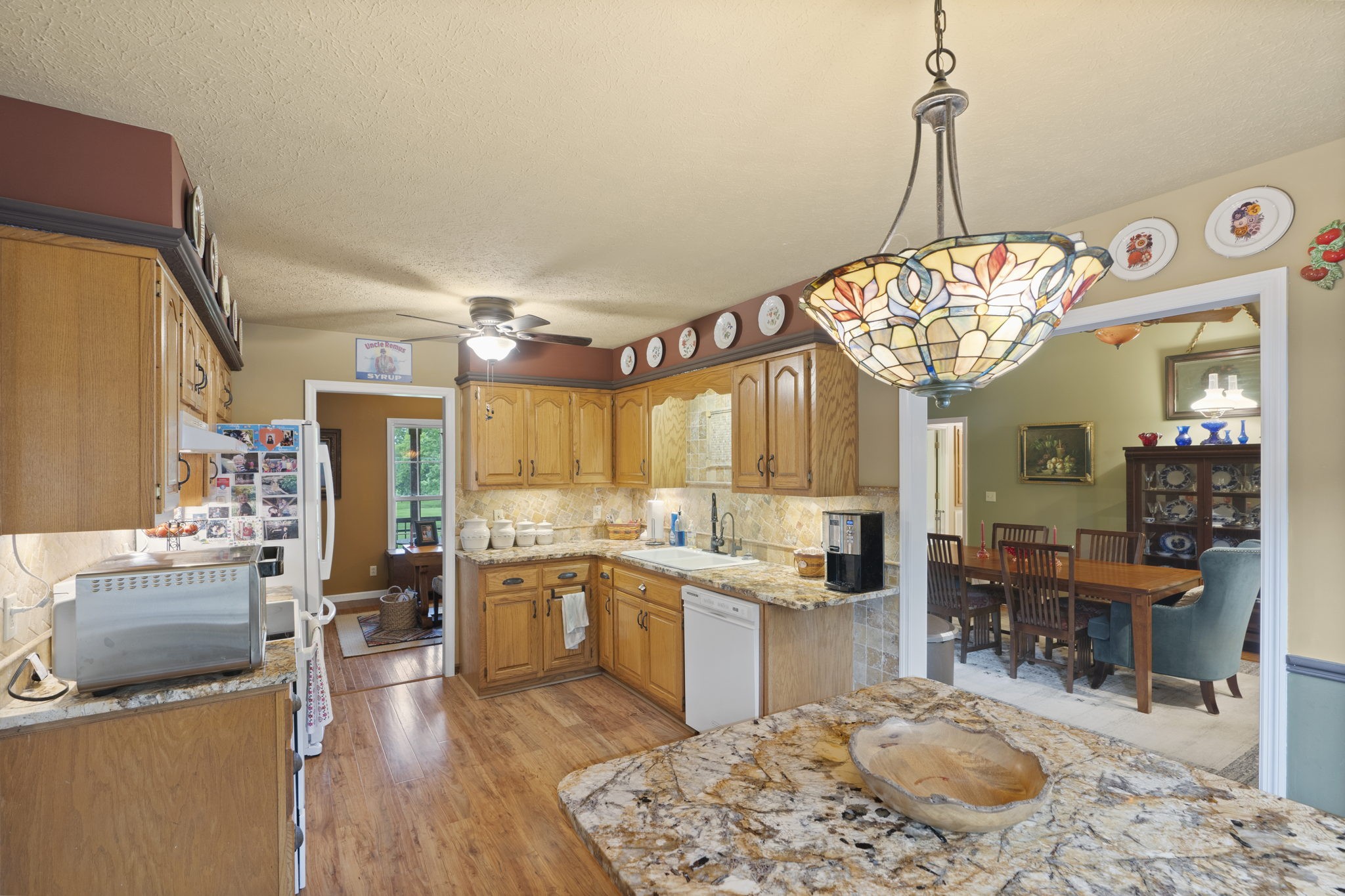 7313 West Cook Road Springfield, TN 37172 - Photo 12 of 40 a large kitchen with a table and chairs in it