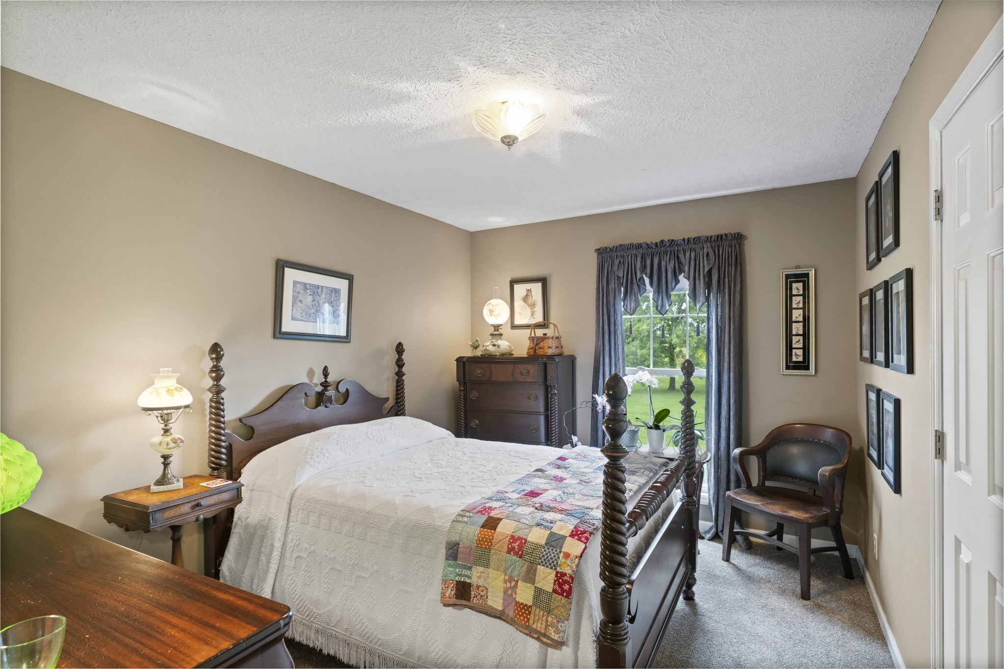 7313 West Cook Road Springfield, TN 37172 - Photo 24 of 40 a bedroom with a bed and wooden floor