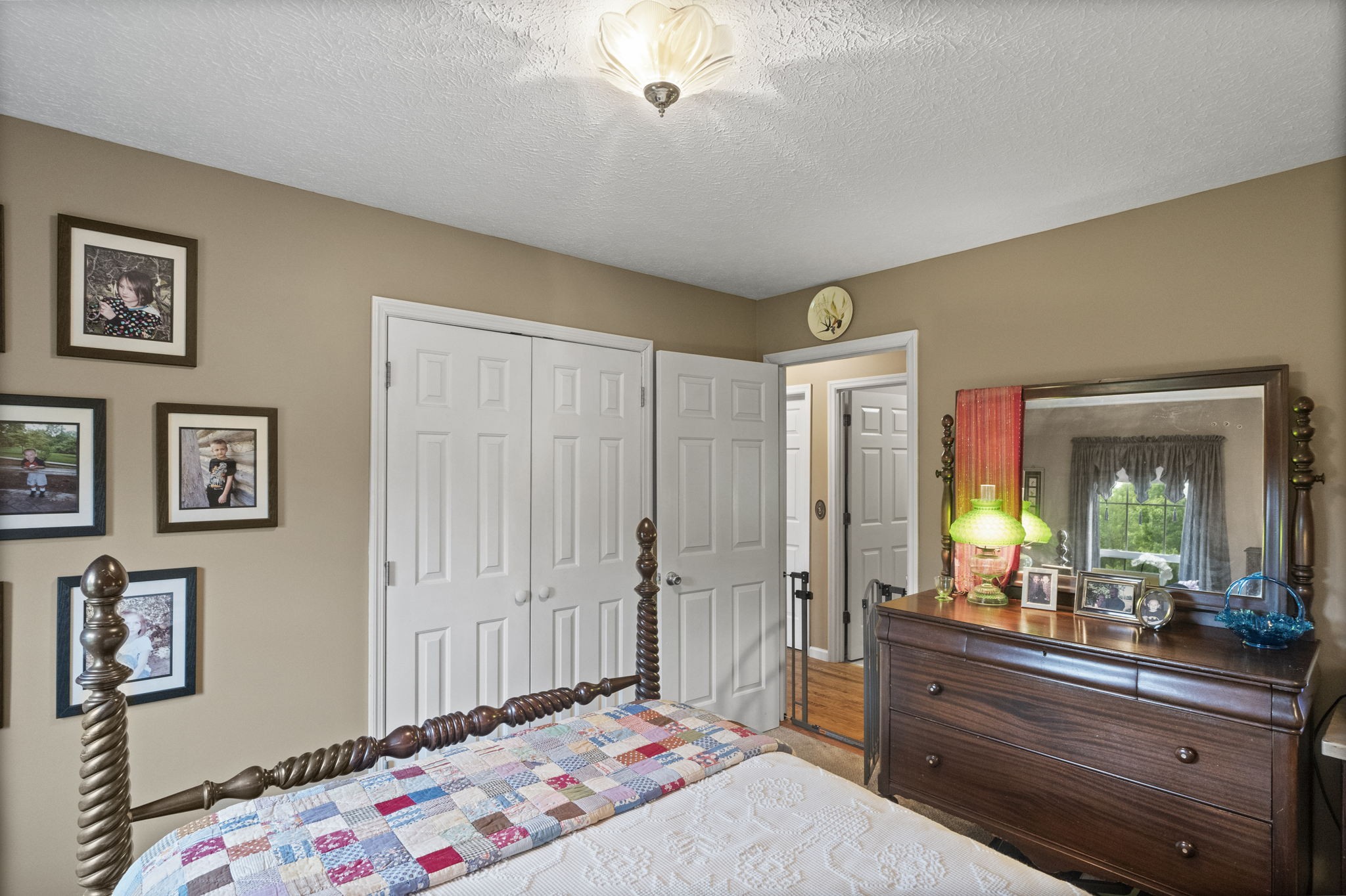 7313 West Cook Road Springfield, TN 37172 - Photo 25 of 40 a bedroom with a bed and a dresser in it