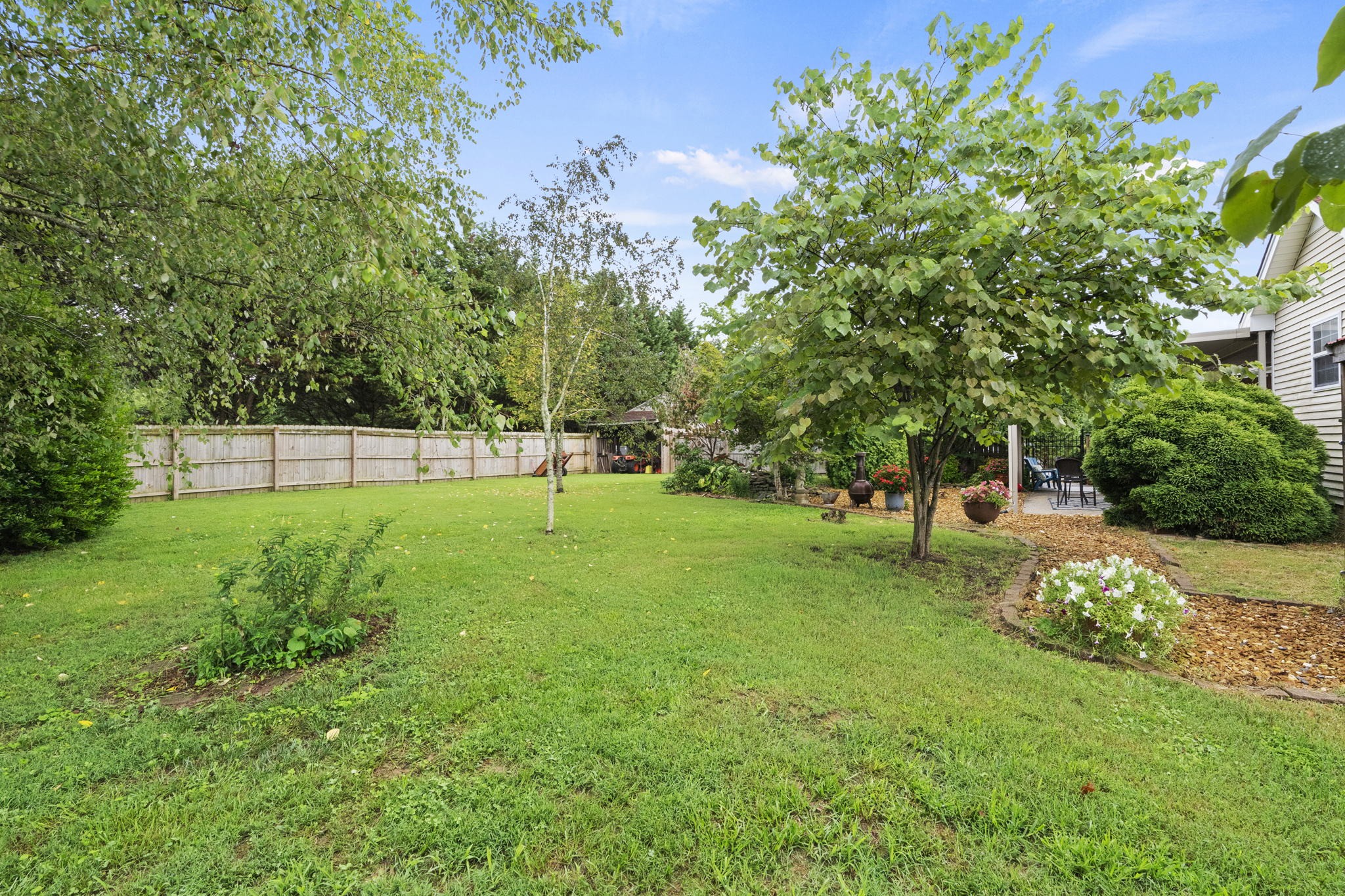 7313 West Cook Road Springfield, TN 37172 - Photo 40 of 40 a view of a house with a backyard