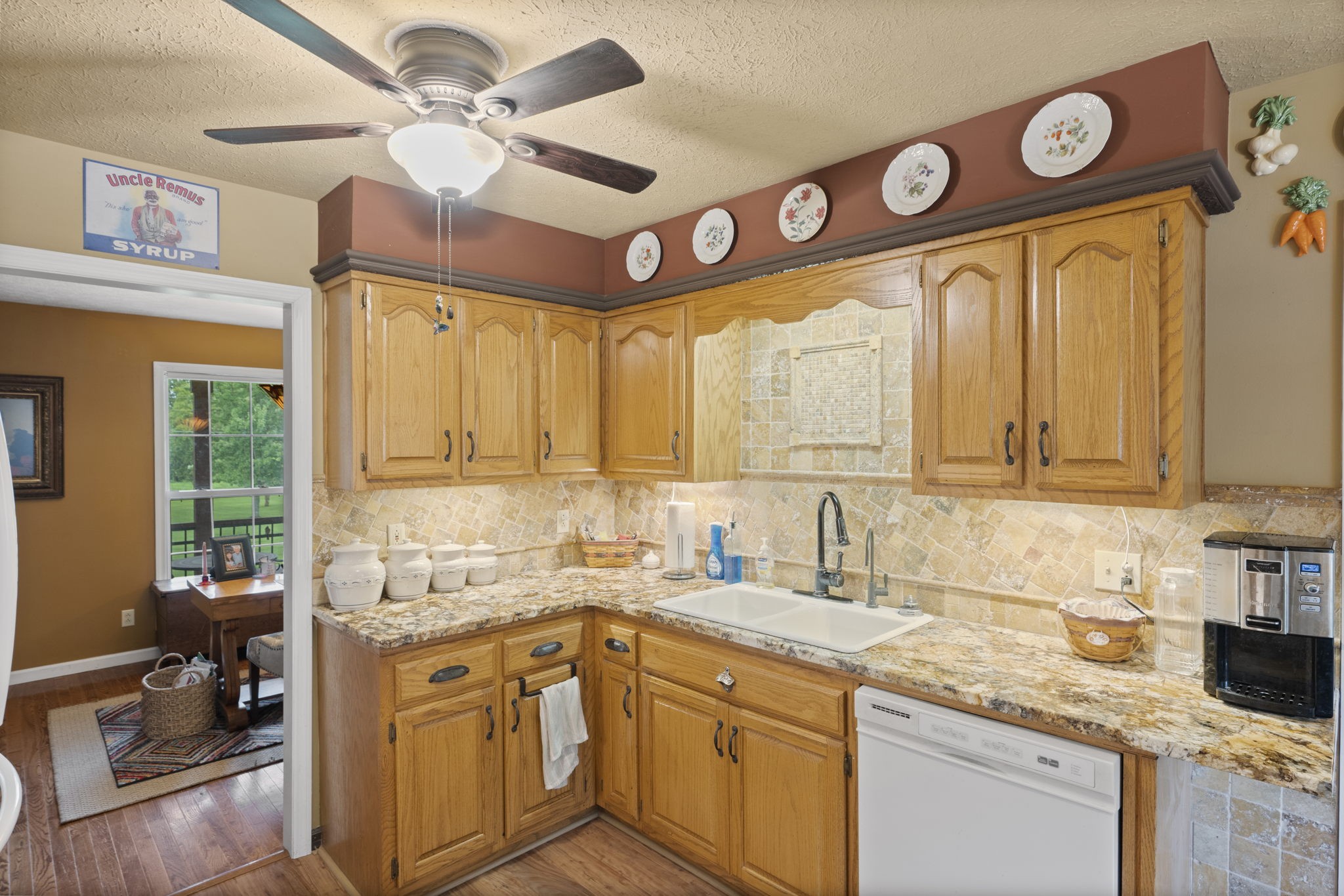 7313 West Cook Road Springfield, TN 37172 - Photo 10 of 40 a kitchen with a sink cabinets and window