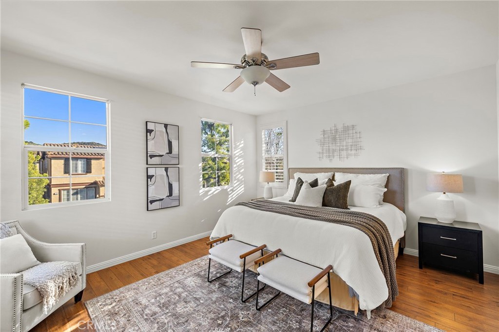 9 Paverstone Lane Ladera Ranch, CA 92694 - Photo 16 of 51 a bed room with a bed and a chair