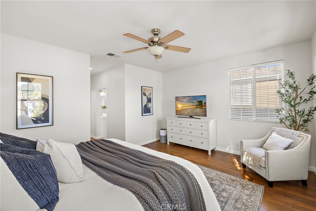 9 Paverstone Lane Ladera Ranch, CA 92694 - Photo 17 of 51 a bedroom with a bed couch and window