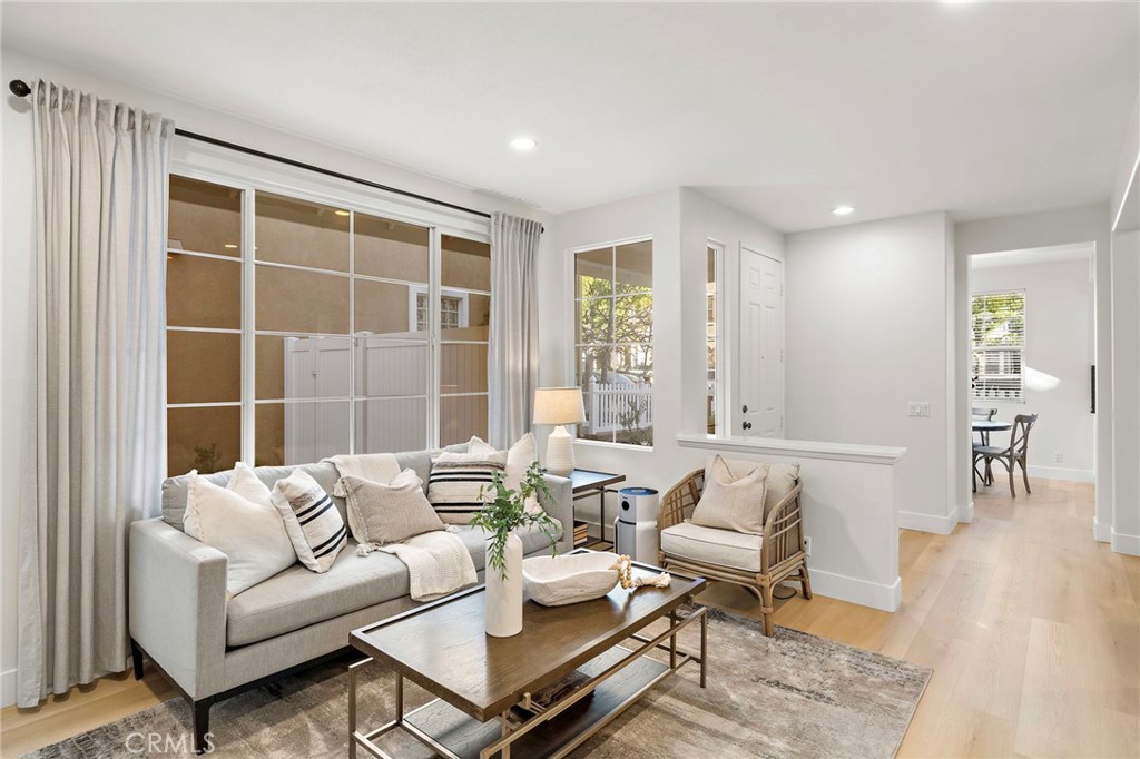 9 Paverstone Lane Ladera Ranch, CA 92694 - Photo 9 of 51 a living room with furniture and wooden floor