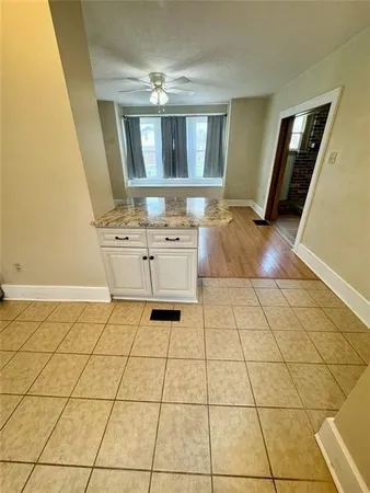 a view of a kitchen from a window