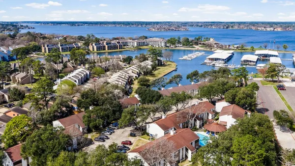 a view of a house with a yard porch and sitting area