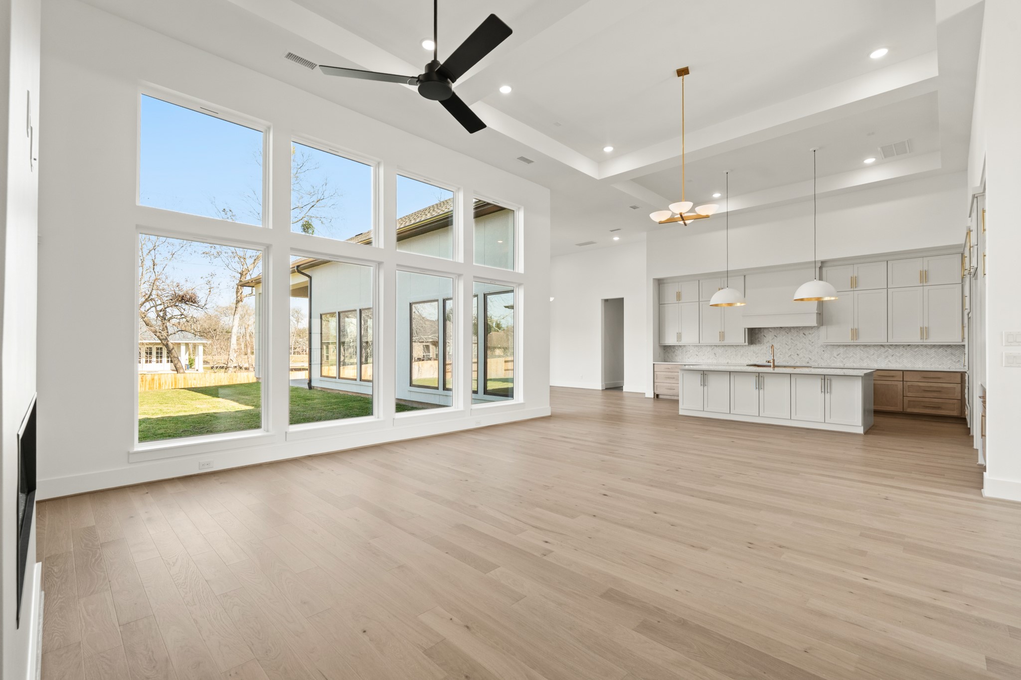 4210 Westgate Lane Fulshear, TX 77441 - Photo 26 of 48 a view of an empty room with wooden floor and a window