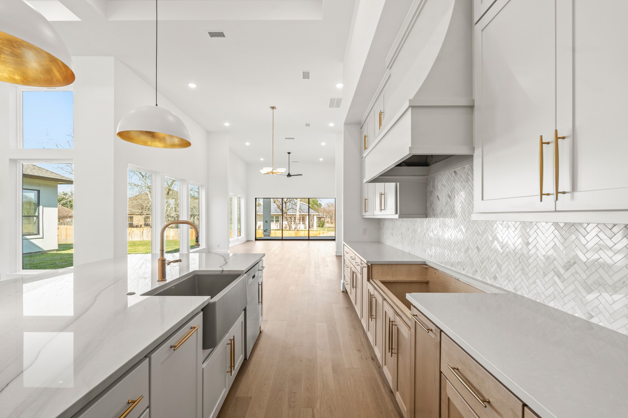 4210 Westgate Lane Fulshear, TX 77441 - Photo 32 of 48 a kitchen with a sink a counter top space and stainless steel appliances